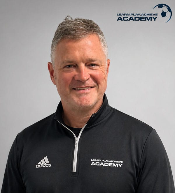 https://www.learnplayachieve.com/wp-content/uploads/2026/07/barry-quinn-LPA-football-academy-west-surrey.jpg